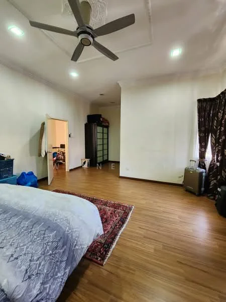 Bedroom features: wooden flooring, white painted walls, tray ceiling, 5-blade ceiling fan, floor-to-ceiling window, dark curtains, area rug with geometric pattern, built-in wardrobe, decorative mirror.