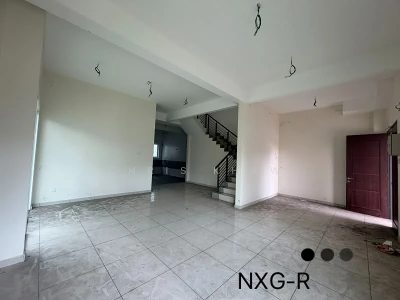 Room features: white painted walls, grey tiled flooring, exposed ceiling with hanging light fixtures, staircase visible in background, large windows allowing natural light, open layout, corner space, no visible furniture; style: modern.