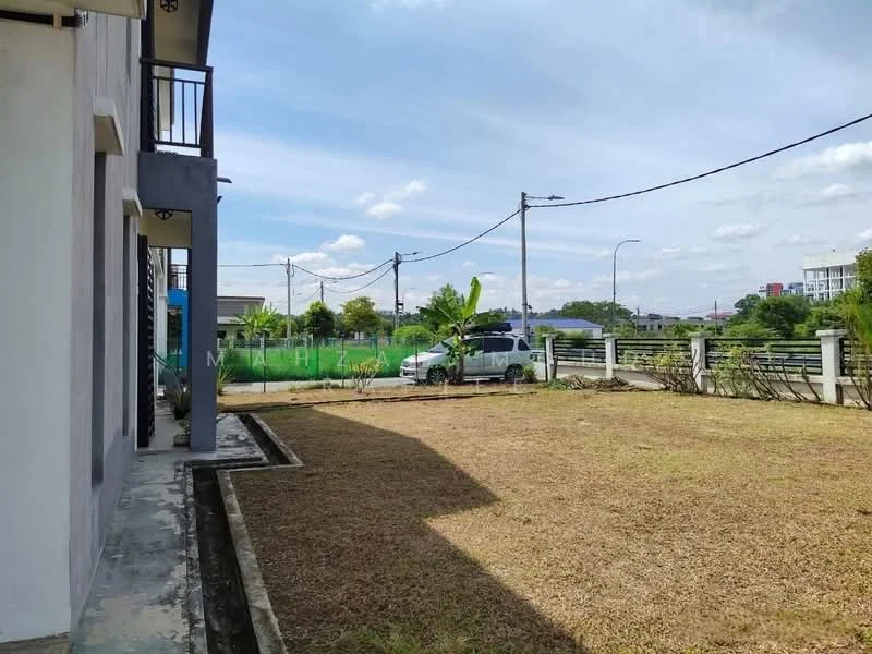 Exterior features: manicured lawn, concrete pathway, fenced perimeter, utility poles visible, surrounding greenery, open space, car parked on driveway, flat terrain; style: modern.