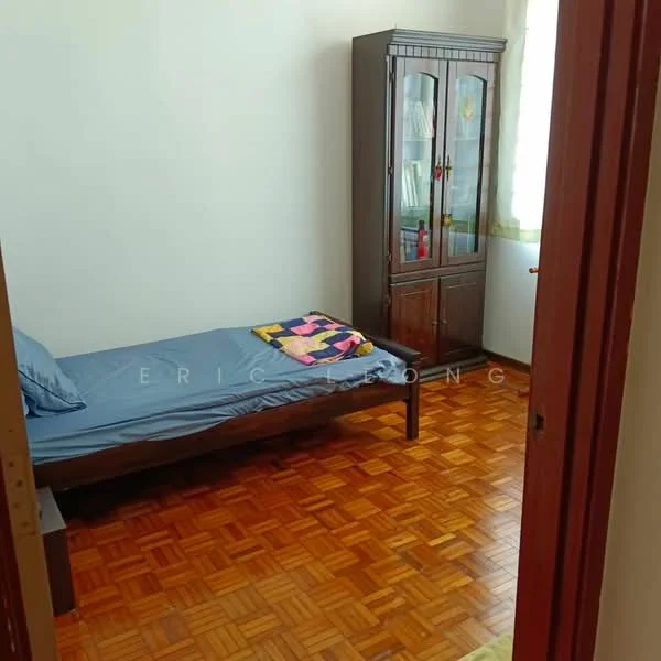 Bedroom features: single bed with blue bedding, wooden bed frame, wooden parquet flooring, brown wooden wardrobe with glass doors, white painted walls, curtains on window, decorative throw blanket on bed; style: minimalist.