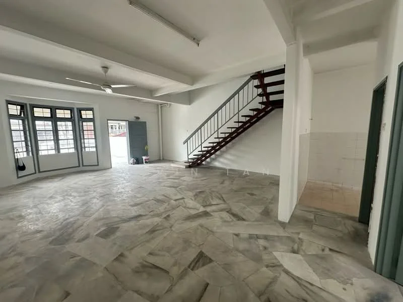Room features: marble flooring, white painted walls, exposed ceiling beams, 5-blade ceiling fan, staircase with wooden steps, large windows with multiple panes, doorway leading to another room, open layout; style: modern.