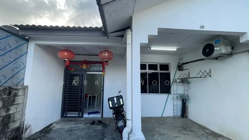Exterior type: linked terrace house; features: white painted facade, flat roof, 1-storey, air conditioning unit on wall, security grille door, decorative red lanterns, motorcycle parked in front, metal shelving unit, concrete flooring, side wall with exposed brick; style: modern.