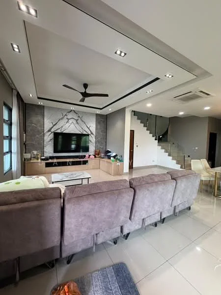 Living features: grey fabric sectional sofa, marble coffee table, wall-mounted TV, TV console with storage, recessed downlights, 5-blade ceiling fan, white painted walls, grey accent wall with stone cladding, large windows with sheer curtains, polished ceramic tile flooring, decorative wall art, open staircase with glass railing; style: modern.