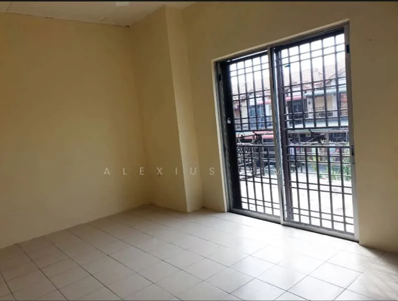 Room features: cream painted walls, tile flooring, floor-to-ceiling sliding glass doors, security grille on doors, natural light from windows, view of outdoor area.