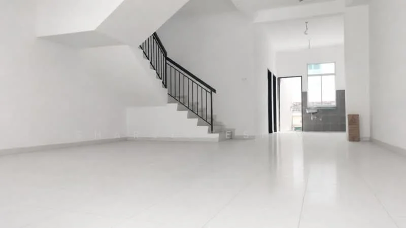 Room features: white painted walls, white tiled flooring, staircase with black railing, large windows, open layout, high ceiling, kitchen area visible in background, natural light from windows; style: modern.