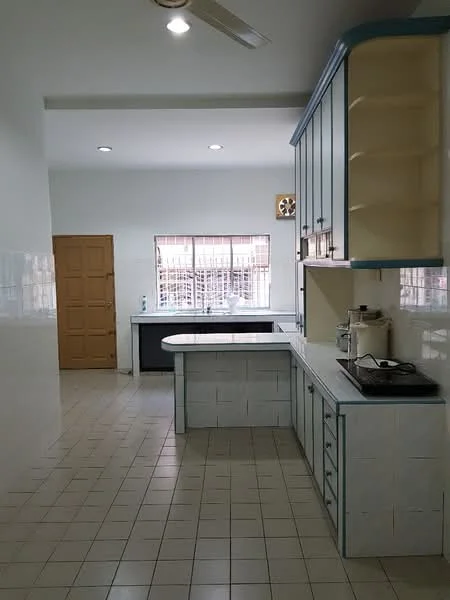 Kitchen features: white tiled walls, light blue cabinetry, white countertop, built-in gas stove, single-bowl stainless-steel sink, window with grid pattern, wooden door, ceiling fan, tile flooring, clock on wall, open layout; style: modern.