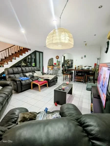 Living features: black leather sectional sofa, 3-seater leather sofa, coffee table, TV console, wall-mounted TV, pendant light, tile flooring, decorative wall clock, dining table with chairs, staircase in background, open layout, decorative items on shelves; style: modern.