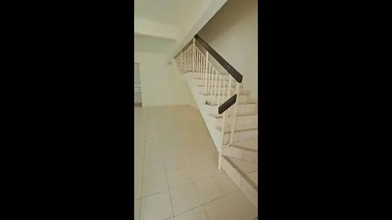 Room features: white walls, tile flooring, staircase with white railing, light-colored handrail, open space, natural light from window, neutral color palette; style: modern.