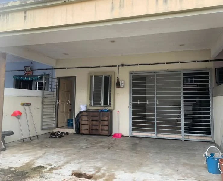Exterior type: linked terrace house; features: concrete flooring, grilled security doors, single-storey, exterior wall painted in cream, manicured lawn, outdoor space with seating area, storage cabinet, visible plumbing fixtures, open space for parking; style: modern.