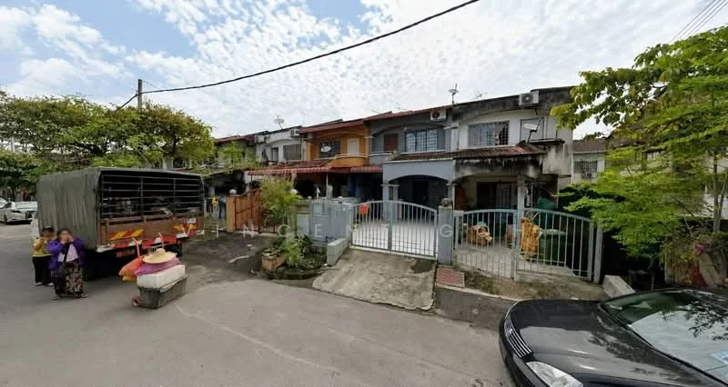 Exterior type: linked terrace house; features: two-storey linked terrace houses, white painted facade, red tiled roof, front porch with gate, driveway with interlocking pavers, visible air conditioning units, manicured landscaping with shrubs, street view with parked vehicles, surrounded by mature trees, open-air parking area; style: modern.