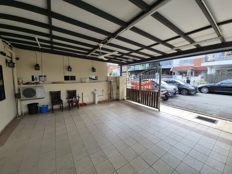 Exterior type: car porch; features: covered car porch, grey tiled flooring, metal roof with beams, wall-mounted air conditioning unit, two wooden chairs, outdoor sink, open gate, driveway with interlocking pavers; style: modern.