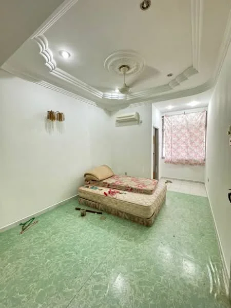 Bedroom features: green marble flooring, white painted walls, tray ceiling with decorative moulding, ceiling fan, 1 wall-mounted split AC, window with floral curtain, double bed with mattress, decorative wall sconce, unfinished flooring work tools visible.