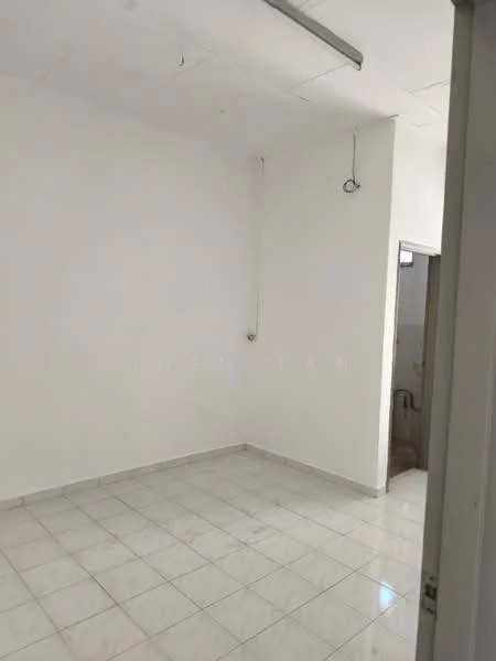 Room features: white painted walls, tile flooring, ceiling with exposed fixtures, no visible windows, empty space.