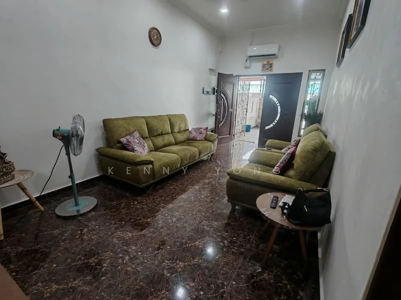 Living features: green fabric 3-seater sofa, green fabric 2-seater sofa, marble flooring, wall-mounted air conditioning unit, wall clock, decorative wall art, wooden front door with circular design, round wooden side table, table with handbag, standing fan; style: modern.