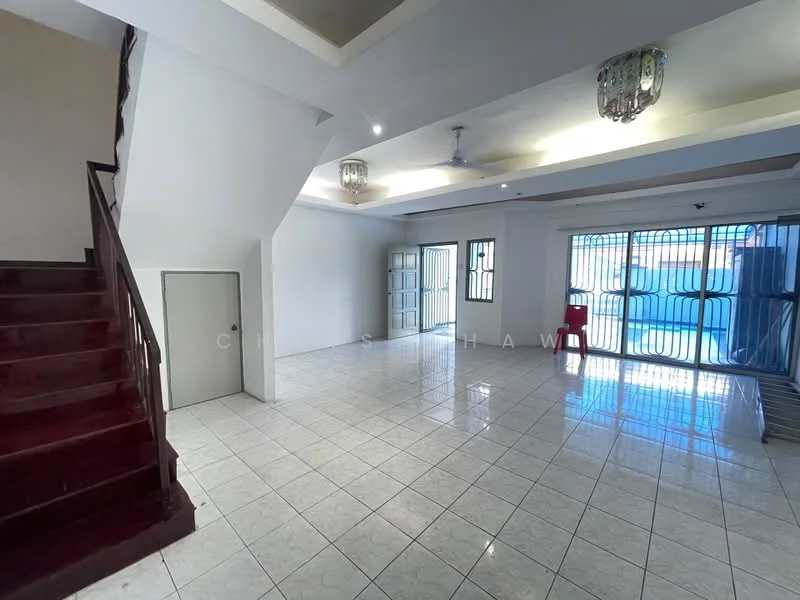 Living features: white painted walls, glossy tile flooring, tray ceiling with recessed lighting, ceiling fan, large windows with metal grilles, double glass doors leading outside, staircase with wooden steps, built-in storage closet, natural light from windows; style: modern.