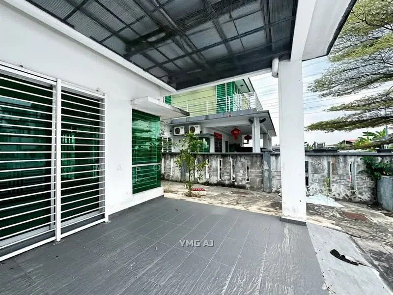 Exterior type: linked terrace house; features: covered patio with glass roof, grey tiled flooring, white painted walls, green sliding glass door, metal railing, exposed concrete wall, visible air conditioning units, surrounding greenery, outdoor space with potential for seating; style: modern.