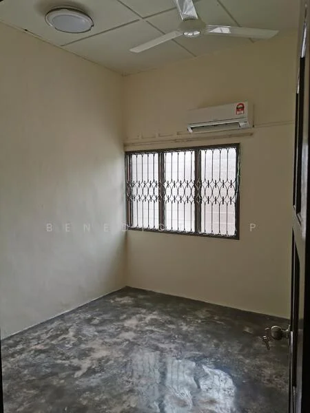 Room features: cream painted walls, polished concrete flooring, 1 wall-mounted split AC, ceiling fan, grilled window with metal bars, light fixture on ceiling, door with knob; style: minimalist.