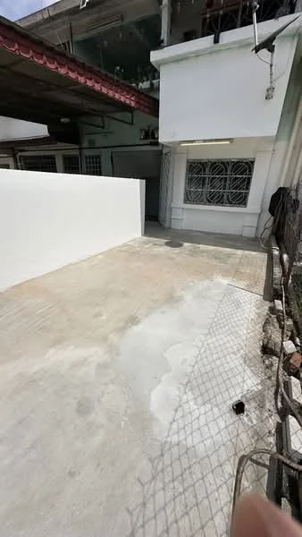 Exterior type: semi-detached house; features: concrete driveway, white painted walls, metal fence, roof overhang, window grilles, outdoor space, paved surface, surrounding wall; style: modern.