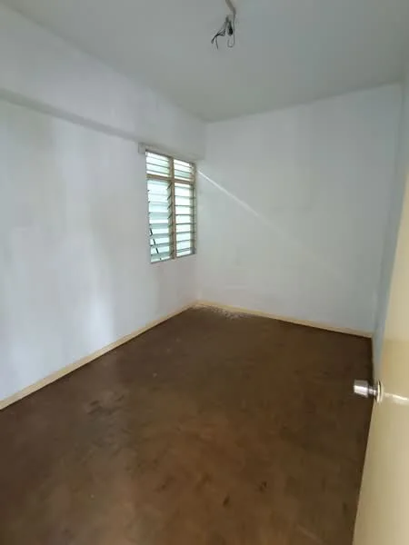 Room features: white painted walls, wooden flooring, sliding windows, single light fixture on ceiling, no visible furniture, empty room.