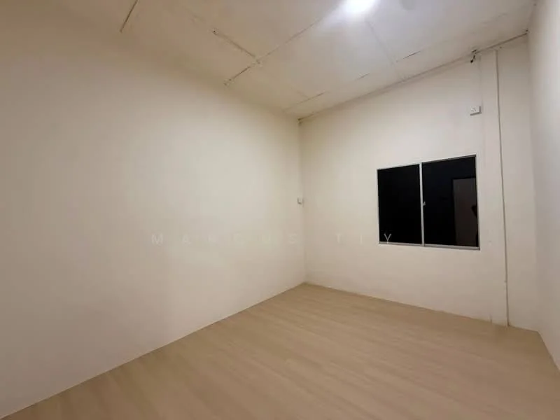 Room features: white painted walls, light wood laminate flooring, single window, plain ceiling, no visible fixtures or furniture; style: minimalist.