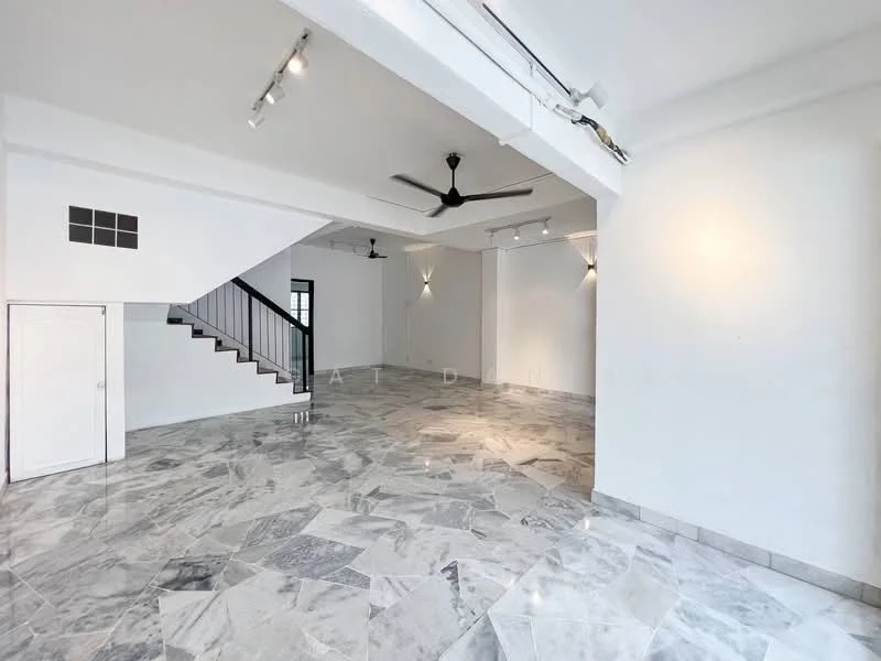 Living features: marble flooring, white painted walls, exposed ceiling with recessed downlights, 5-blade ceiling fan, staircase with black railing, large open space, natural light from windows, no visible furniture; style: modern.