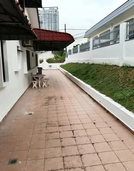 Exterior features: paved walkway, white painted walls, red tiled roof, manicured grass area, fenced boundary, adjacent building visible, overcast sky; style: modern.