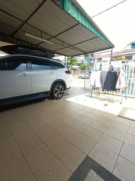 Exterior type: car porch; features: covered car porch, white SUV parked, tiled flooring, clothes drying rack, laundry hanging, surrounding fence, outdoor area, green awning; style: modern.