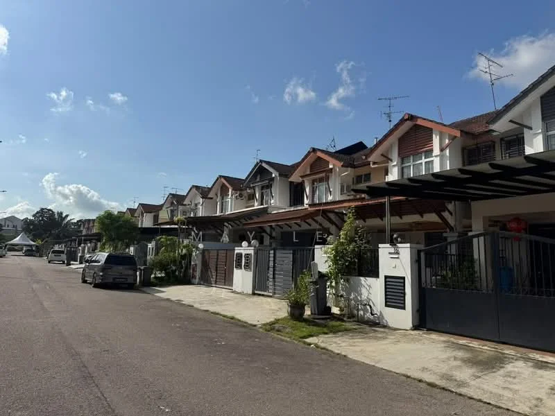 Exterior type: linked terrace house; features: two-storey houses, gabled roofs, white painted facade, red accent details, driveways with interlocking pavers, manicured front gardens, covered car porches, visible antennas on rooftops, street view with clear sky; style: modern.