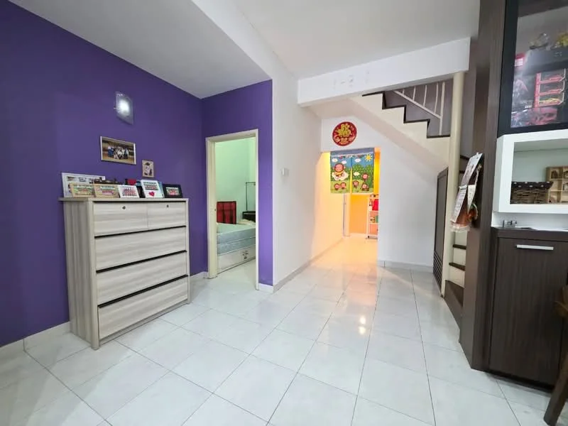 Room features: purple accent wall, white painted walls, white tiled flooring, staircase with wooden handrail, chest of drawers, decorative wall frames, doorway leading to another room, doorway leading to a bathroom, light fixture on ceiling; style: modern.