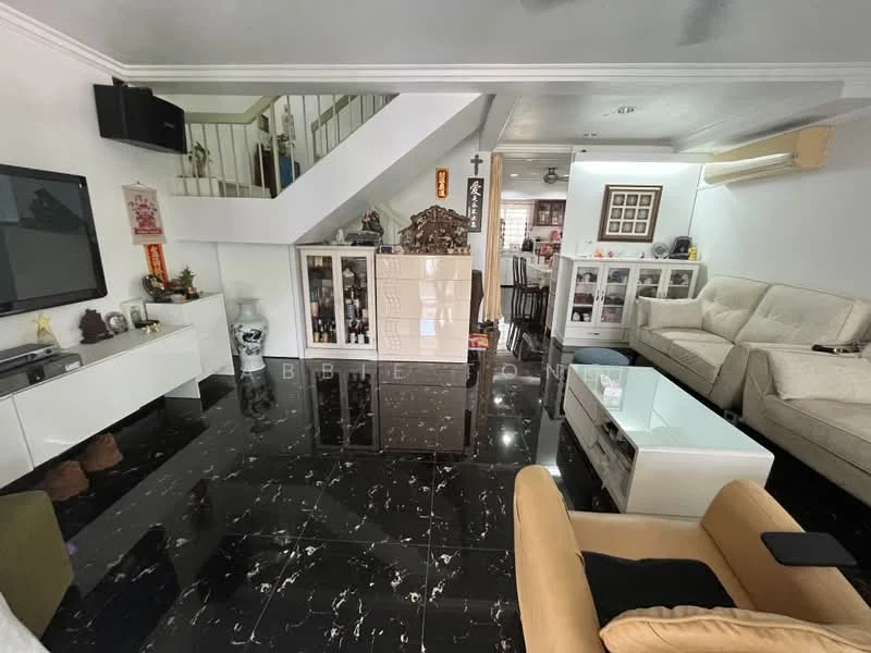 Living features: black marble flooring, white painted walls, sofa in cream fabric, armchair in beige fabric, white TV console, wall-mounted TV, coffee table with glass top, decorative items on shelves, recessed ceiling lights, air conditioning unit, staircase leading to upper floor, decorative wall art; style: modern.
