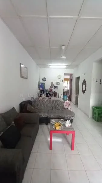 Living features: grey fabric sofa, 3-seater sofa, coffee table with red legs, decorative plates on table, white tiled flooring, ceiling fan, wall-mounted clock, framed artwork on wall, green laundry basket, open layout to adjacent room; style: modern.