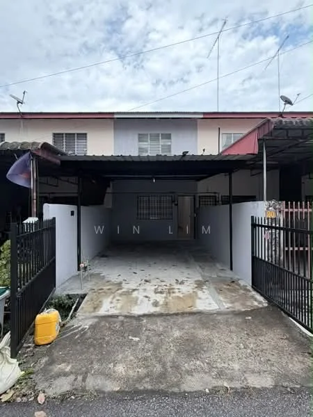 Exterior type: linked terrace house; features: car porch with awning, concrete driveway, white painted facade, metal gate, front garden area, two-storey structure, roof overhang, visible windows on upper floor, fence surrounding property; style: modern.