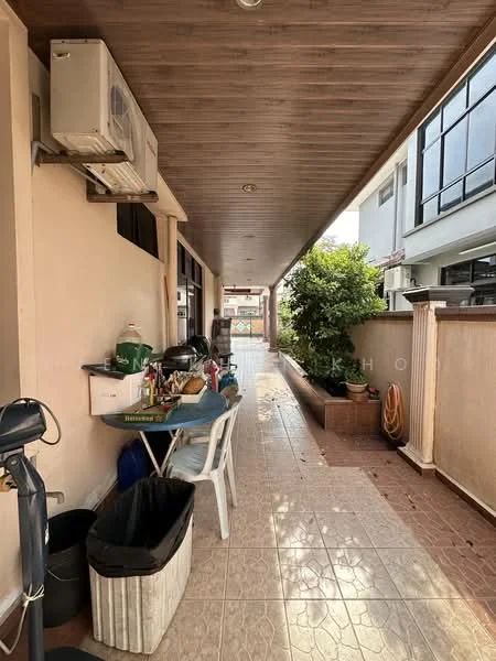Room features: wall-mounted split AC, wooden ceiling, ceramic tile flooring, outdoor table with chairs, plastic waste bin, potted plant, wall-mounted planters, decorative wall, fence, visible drainage, outdoor hose.