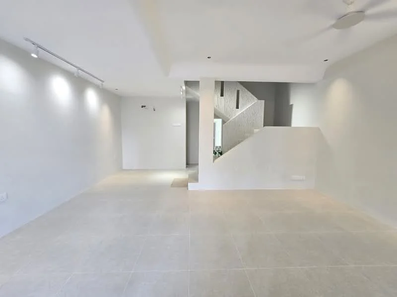 Room features: light grey tiled flooring, white painted walls, recessed downlights, ceiling fan, staircase in background, open layout, natural light from windows, minimalist decor; style: modern.
