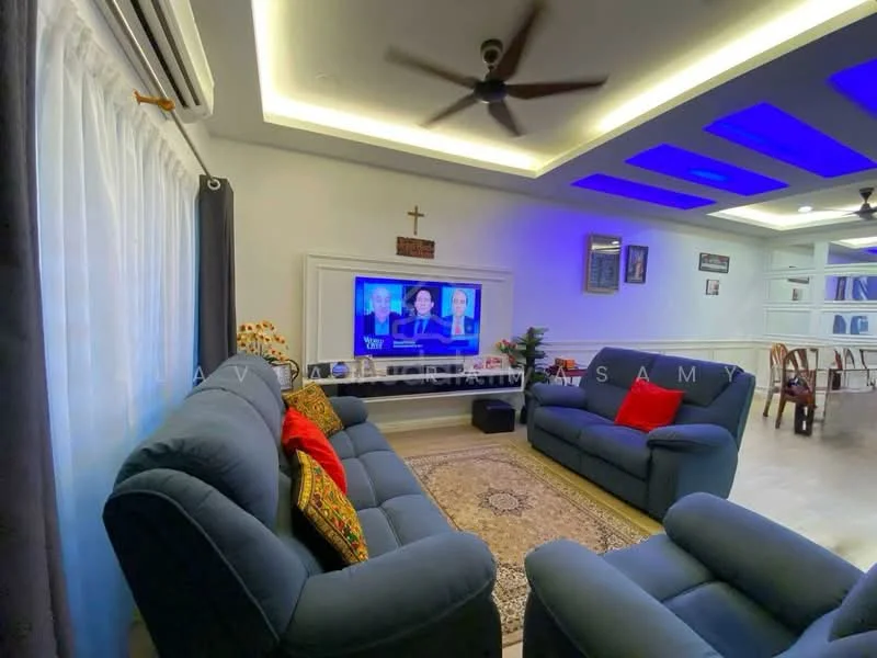 Living features: 3-seater fabric sofa in blue, 2-seater fabric sofa in blue, red decorative cushion, area rug with intricate pattern, wall-mounted TV, white painted walls, recessed LED downlights, ceiling fan, curtains in white, decorative plant, wooden coffee table, decorative wall cross; style: modern.
