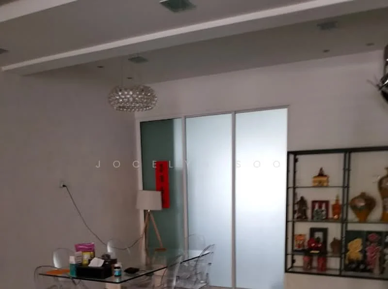 Room features: white painted walls, dropped ceiling, recessed downlights, chandelier, glass sliding door, decorative shelving unit, dining table with transparent chairs, floor lamp, decorative items on shelves; style: modern.