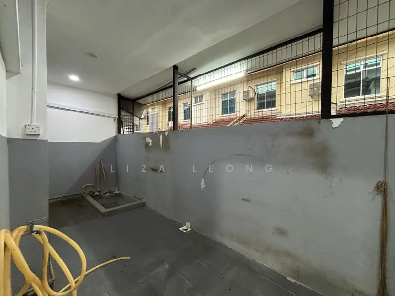 Room features: grey tiled flooring, white painted walls, metal fencing, drainage area, exposed pipes, air conditioning units visible outside, window with view of exterior, lighting fixtures on ceiling.