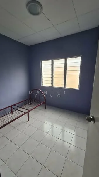 Bedroom features: purple painted walls, white tiled flooring, single bed frame without mattress, sliding windows with metal grills, ceiling light fixture, corner room, no visible closet or storage, minimal decor; style: minimalist.