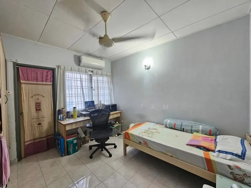 Bedroom features: single bed with colorful bedding, study desk with chair, wall-mounted air conditioning unit, ceiling fan, window with sheer curtains, light fixture on wall, tiled flooring, built-in wardrobe.