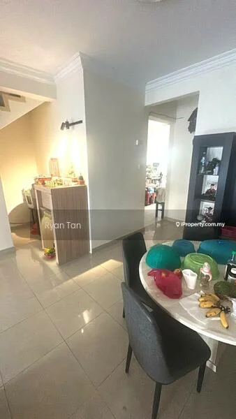Dining features: round dining table, black dining chairs, ceramic plates, glass vase, fruit bowl with bananas, decorative tablecloth, tile flooring, white painted walls, recessed lighting, wall-mounted light fixture; style: modern. Room features: staircase, wooden cabinetry, decorative items on cabinet, open space leading to another room.
