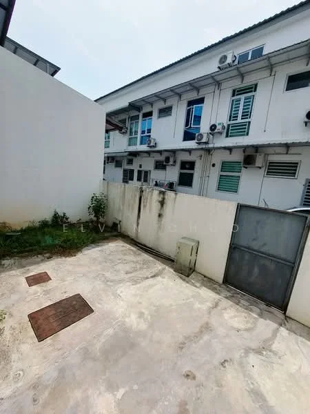 Exterior type: linked terrace house; features: concrete flooring, exterior wall with white paint, visible air conditioning units, metal gate, surrounding greenery, fenced area, two-storey building, backyard space; style: modern.