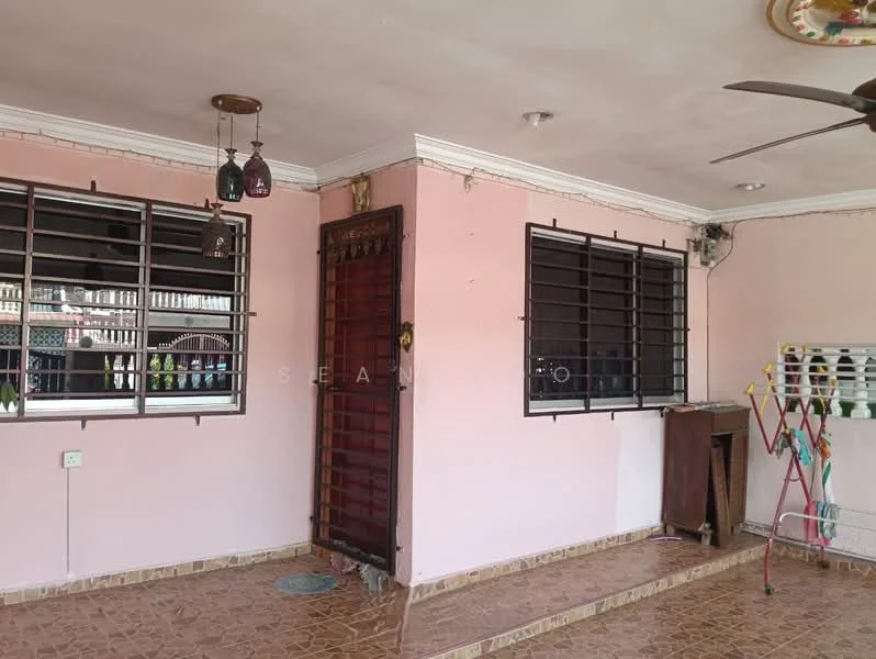 Room features: pink painted walls, tile flooring, ceiling fan, metal window grills, door with glass panel, hanging light fixtures, open space layout, clothes drying rack.