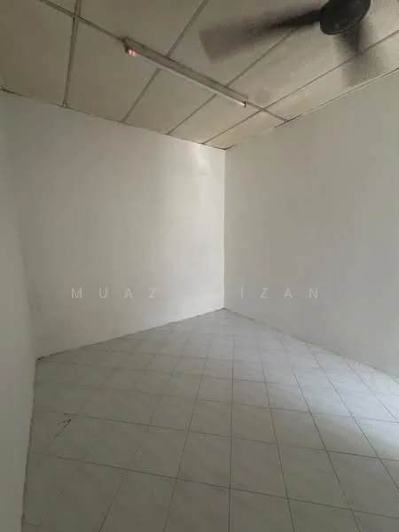 Room features: white painted walls, tile flooring, ceiling fan, square layout, no visible windows, plain ceiling, no visible furniture, neutral color scheme.