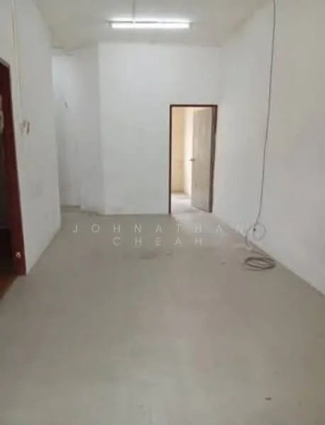 Room features: white painted walls, concrete flooring, ceiling lights, doorway leading to another room, doorway leading to hallway, exposed electrical wiring; style: minimalist.