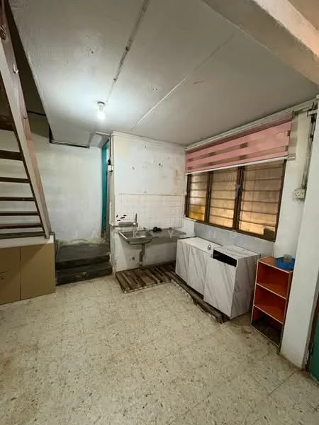 Laundry features: single-bowl sink, white cabinetry, wooden countertop, pink striped window blinds, exposed ceiling, tile flooring, staircase leading to upper level, wooden pallets as flooring base, wall-mounted faucet.