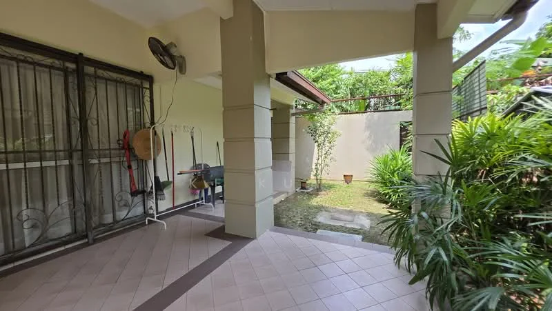 Room features: tiled flooring in beige, cream painted walls, sliding glass door, wall-mounted split AC, outdoor garden view, potted plants, manicured grass area, covered patio area; style: modern; view: garden.