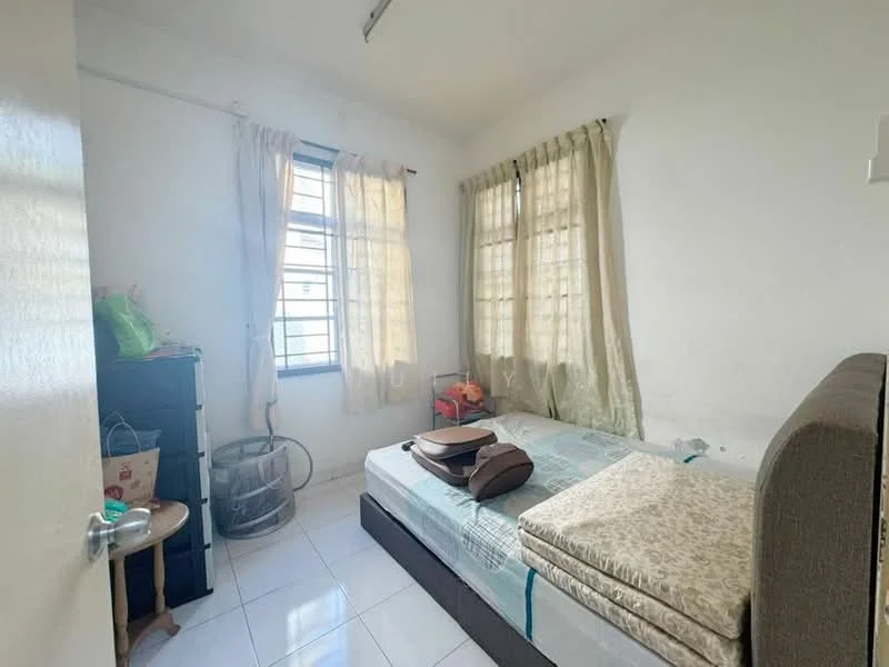Bedroom features: single bed, upholstered headboard, white painted walls, tile flooring, two windows with sheer curtains, built-in wardrobe, small bedside table, decorative items on the floor.