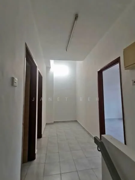 Hallway features: white painted walls, tile flooring, ceiling light fixture, door frames, natural light from skylight, neutral color scheme.