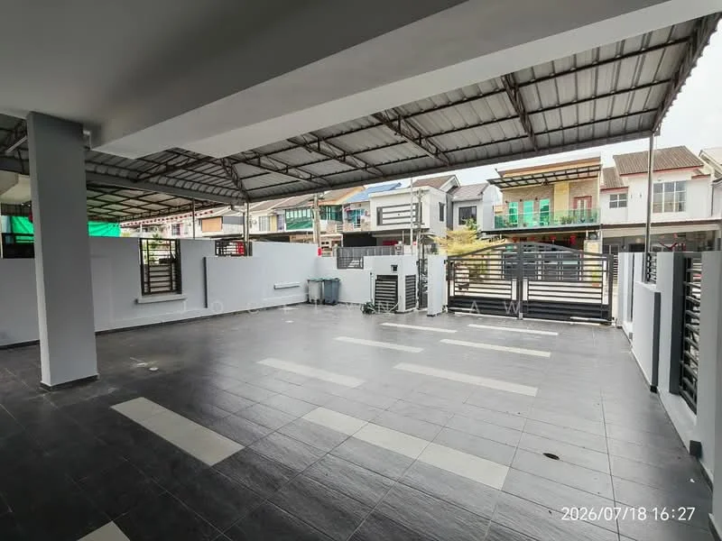 Exterior type: linked terrace house; features: covered car porch, grey tiled flooring, metal roof, perimeter fencing, manicured lawn, surrounded by residential houses, open space for parking, sliding gate; style: modern.