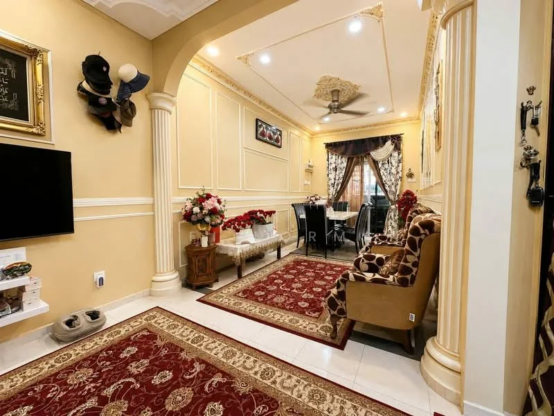 Living features: cream painted walls, crown moulding, exposed beams on ceiling, 5-blade ceiling fan with light, wall-mounted TV, decorative wall clock, framed artwork, area rug with floral pattern, sofa with floral upholstery, coffee table, dining table with chairs, large window with curtains; style: traditional.